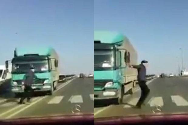 Bakıda piyada son anda yük maşınının altında qalmaqdan qurtuldu - VİDEO