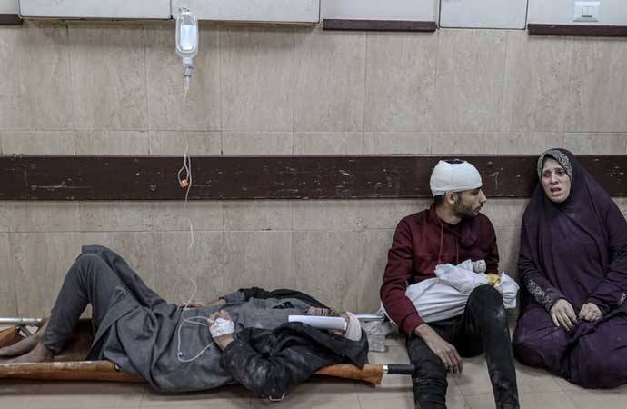 İsrail ordusu Qəzzada bir binanı hədəf aldı - Çox sayda ölü və yaralı var