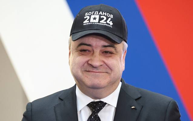 Putinin daha bir rəqibi seçkidən geri çəkildi