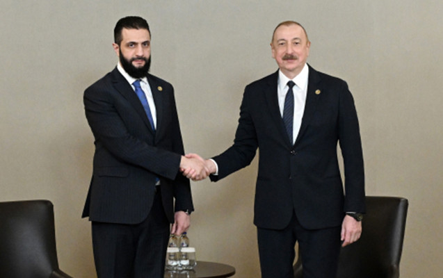 İlham Əliyev Suriyanın keçid dövrü Prezidenti ilə görüşdü