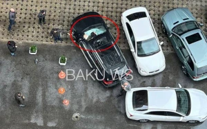 Bakıda gənc oğlan 15-ci mərtəbədən maşının üstünə düşdü - VİDEO