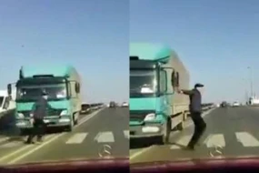 Bakıda piyada son anda yük maşınının altında qalmaqdan qurtuldu - VİDEO