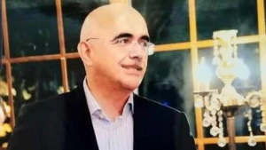 İş adamı yüksək vəzifəli məmurun maşınına hücum edib? 