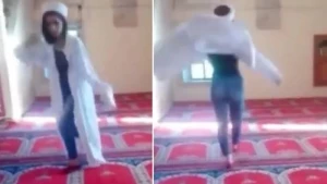 Məsciddə biabırçılıq: Gənc qız imam paltarı geyinib “hoqqa verdi” - FOTO/VİDEO