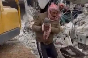 Dağıntılar altında dünyaya gələn körpə övladlığa götürüldü - FOTO