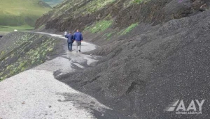 Quba-Xınalıq yolunun bir hissəsi lil və qaya parçalarından təmizləndi - FOTOLAR