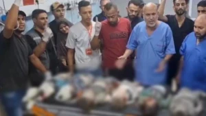 Həkim hücumlarda həyatını itirən uşaqların cənazələri önündə dünyaya səsləndi