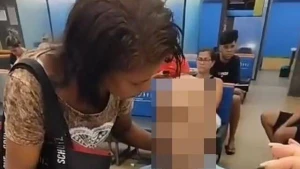 Ölən yaşlı kişini banka gətirdi - Kredit götürməyə çalışdı - VİDEO