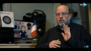 Makronu tənqid etdiyi üçün təqib edilən erməni jurnalist AzTV-yə danışdı - VİDEO