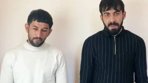 Hədə-qorxu ilə yığdıqları pulları həbsxanaya göndərənlər tutuldu - VİDEO