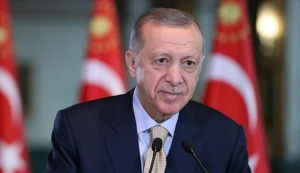 Ərdoğan CHP liderindən aldığı təzminatı hərbi fonda bağışladı