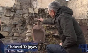 Laçındakı dağılmış evində nənəsindən qalan səhəngi tapdı - VİDEO