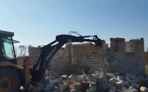 Daha bir qanunsuz tikili söküldü - VİDEO