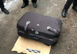 Çamadanın içində uşaq meyiti aşkar edilib - VİDEO