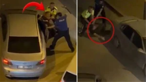 Polis məmuru qəza sonrası qaçan sürücünü döydü - VİDEO