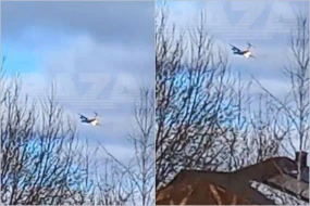 Rusiyada havada alovlanan təyyarə qəbiristanlığa təcili eniş etdi - VİDEO