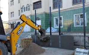 Daha bir qanunsuz tikili söküldü - VİDEO