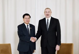 İlham Əliyev Laosun Prezidenti ilə görüşdü