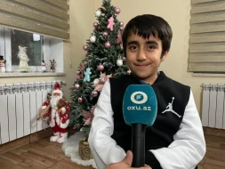 Sığınacaqda tək, amma \"Qarabağ\"la bir yerdə: Kiçik qəlbin böyük sevgisi - VİDEO