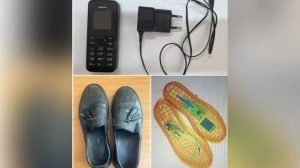 Həbsxanaya ayaqqabının içində telefon keçirmək istədi